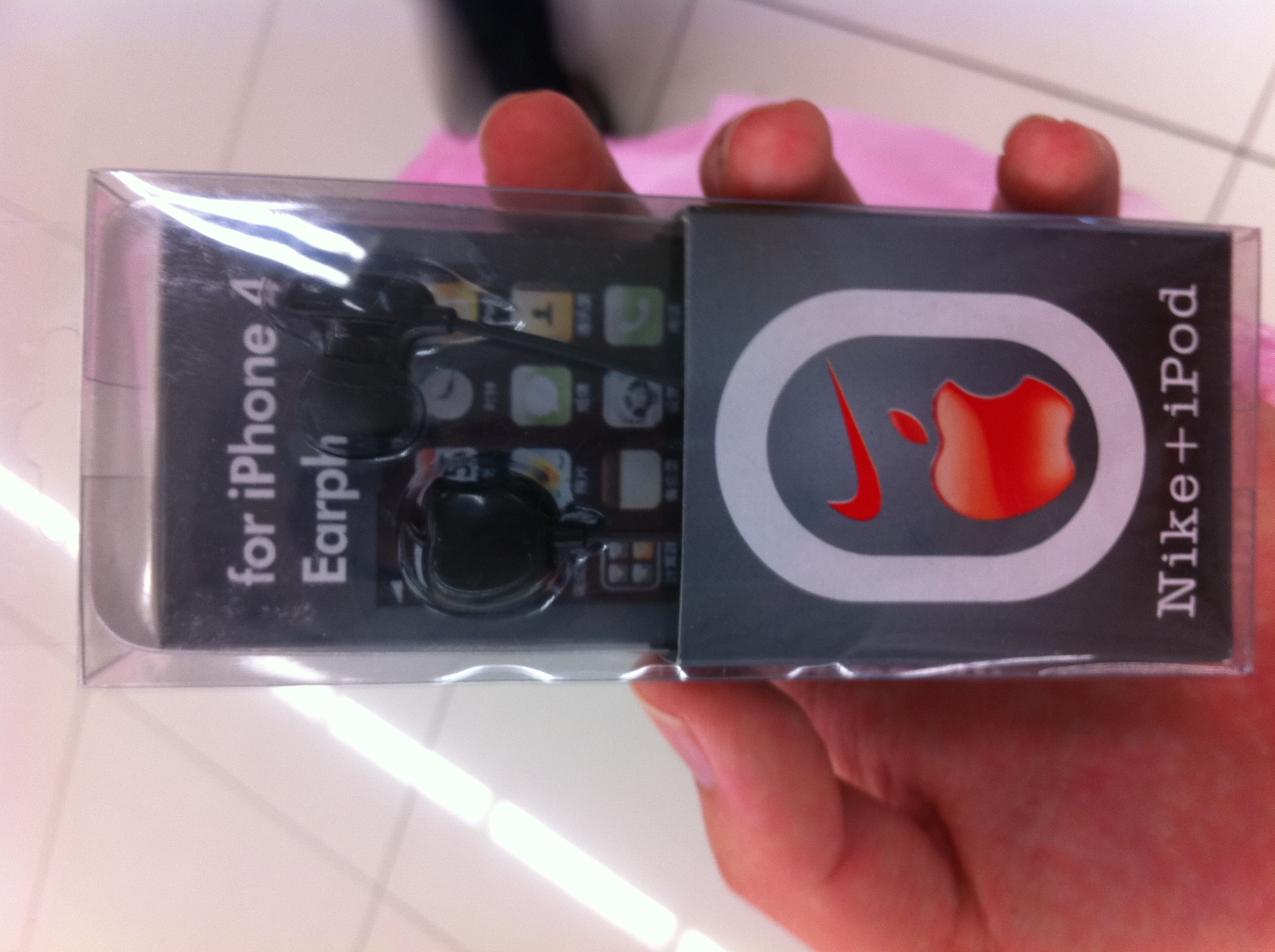 A package of earphones that indicate they're Nike + iPod