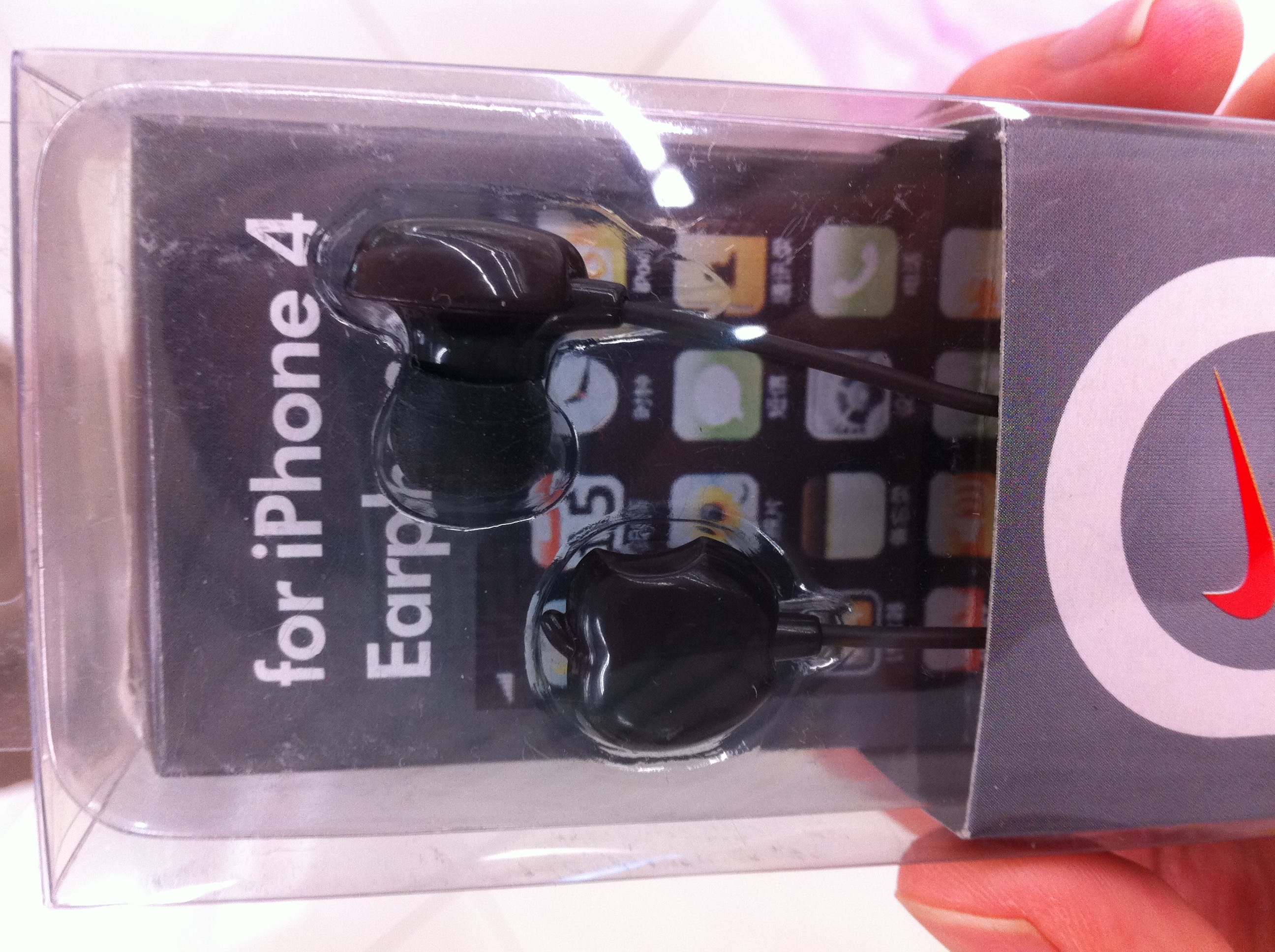 Earphones shaped like the Apple logo