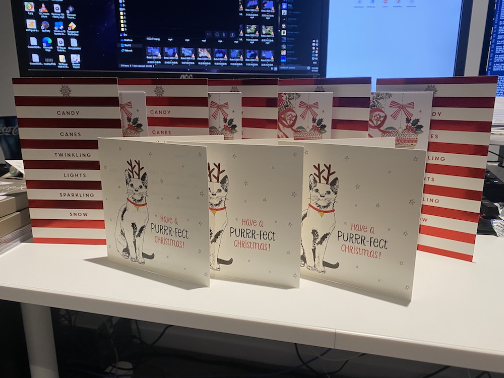 A collection of Christmas cards with hand-written, personalised messages