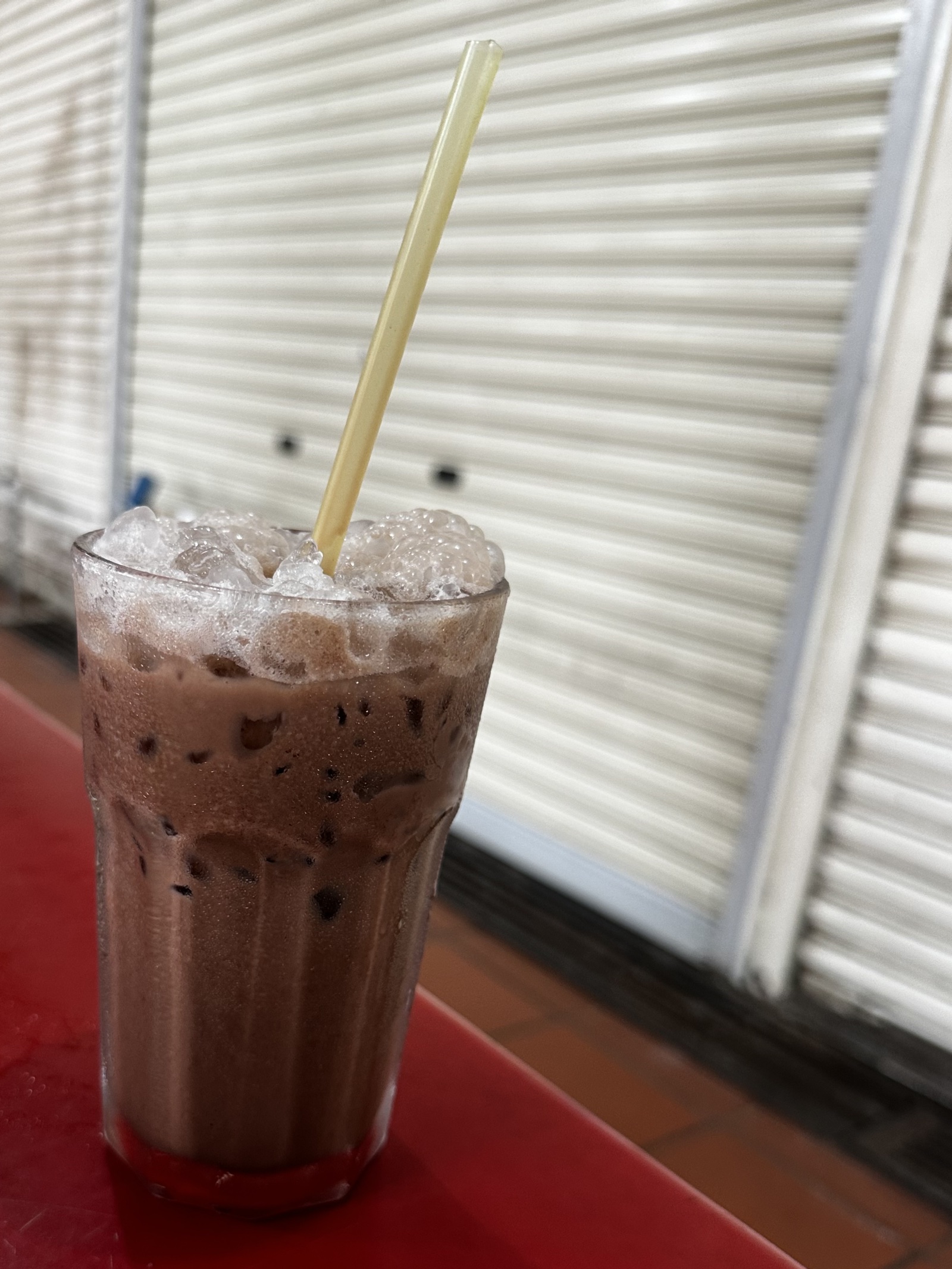 A glass of milo peng as drunk in Penang, Malaysia