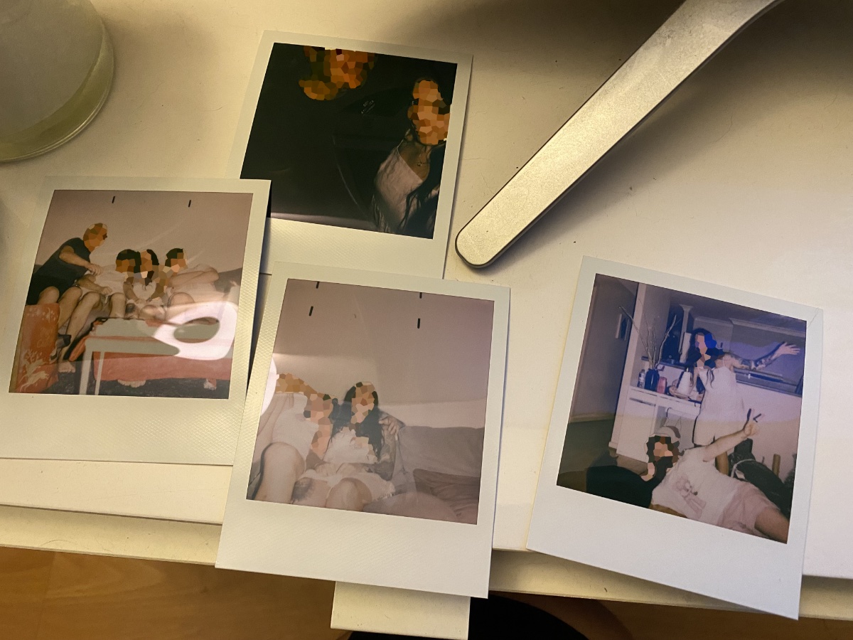 A set of four Polaroids taken with friends