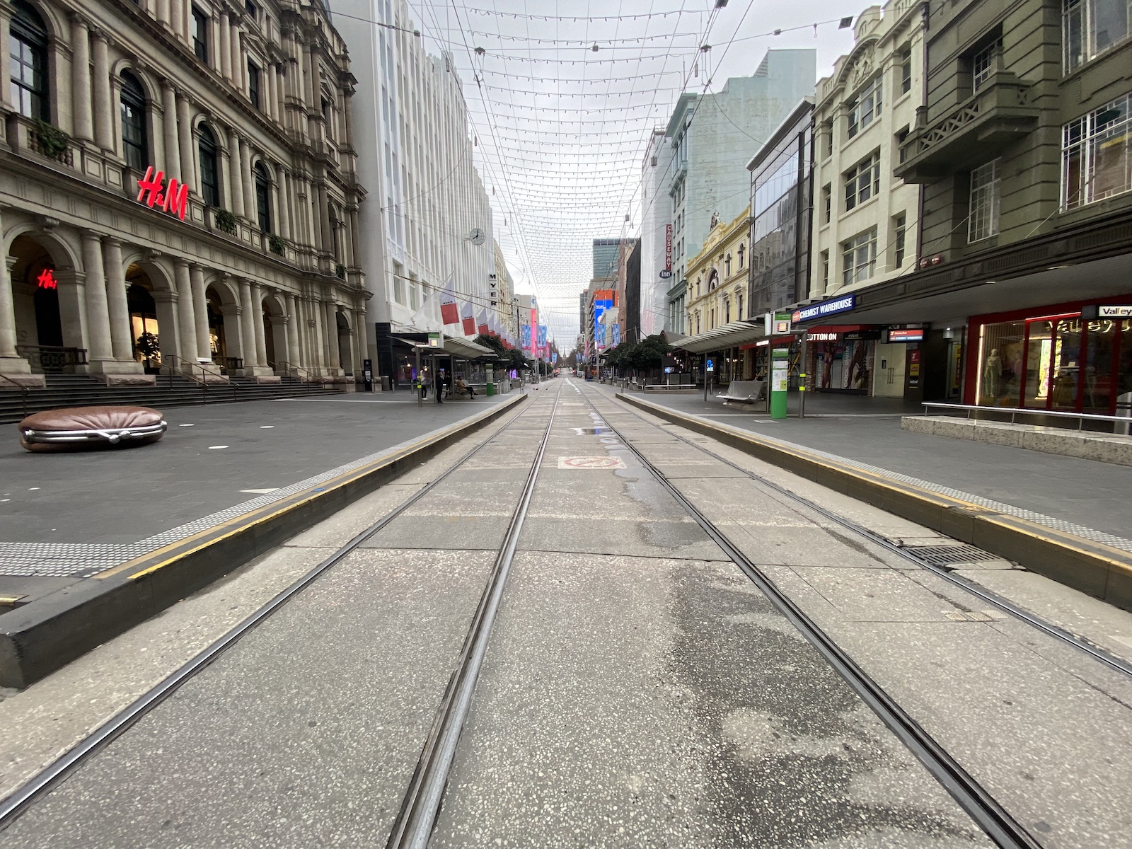 A almost street-level view of an almost-deserted Bourke Street in Melbourne, Australia