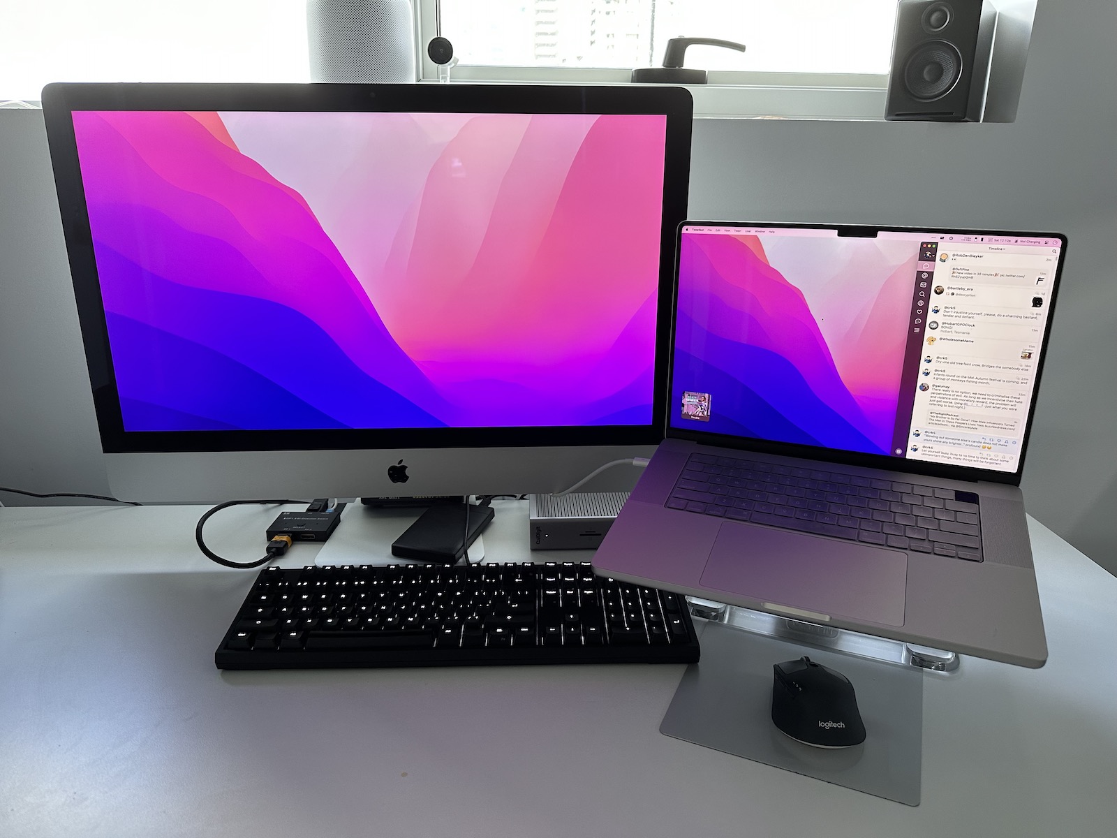 My current desktop setup - a 16-inch M1 Pro Macbook Pro paired with a 5K iMac converted to be an external display